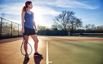 Photo of woman with tennis racquet